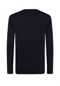 Maglione lungo blu navy con scollo tondo, realizzato in un tessuto lavorato a maglia liscio; presenta polsini e orlo a costine.