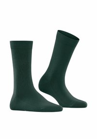 Para ciemnozielonych skarpetek do kostek, prezentujących widok z przodu i z boku, z prążkowanym ściągaczem i gładką teksturą na białym tle.