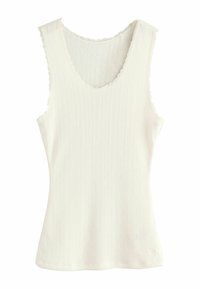 White sleeveless tank top with a ribbed texture, scalloped edges, and a V-neck design. Smooth fabric with subtle pattern detailing.