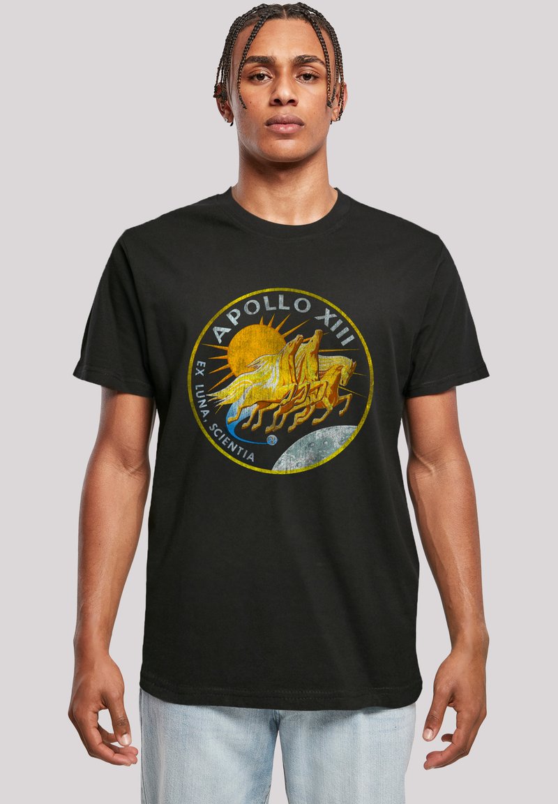 Black cotton t-shirt featuring a circular graphic of Apollo XIII, with yellow horses, a sun, and a moon, along with text in white and yellow.
