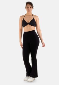 YantraConnection KISIMA EVASÉ - Pantaloni - black