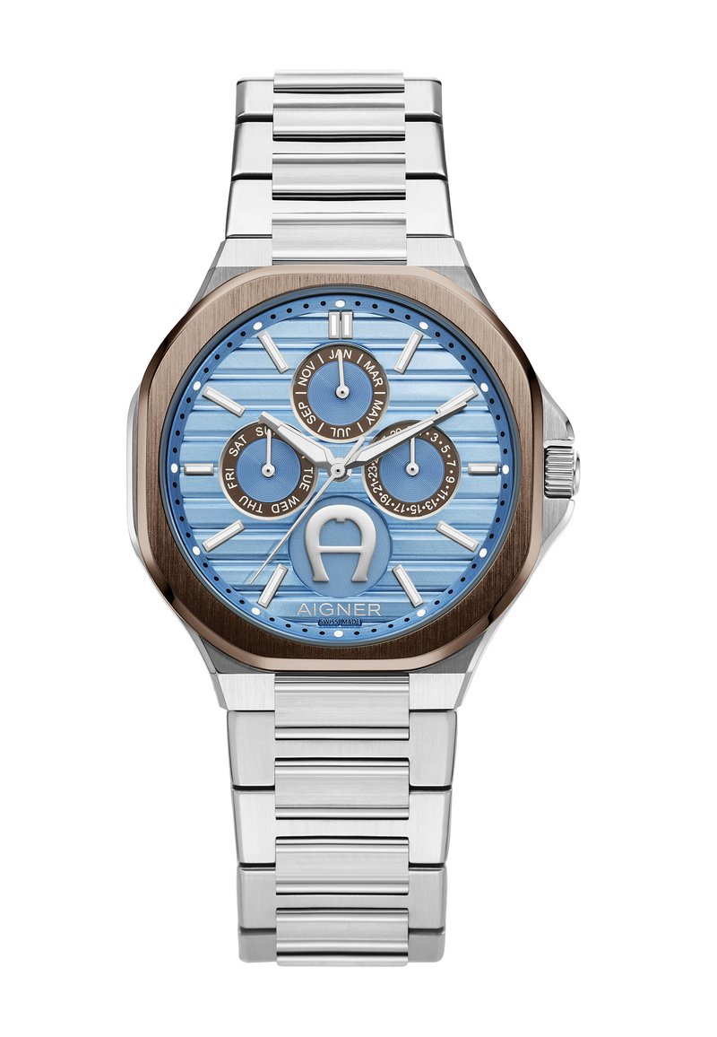 Silver stainless steel watch with a blue textured dial, brown accents, three subdials, and a link bracelet. Features a distinctive logo.