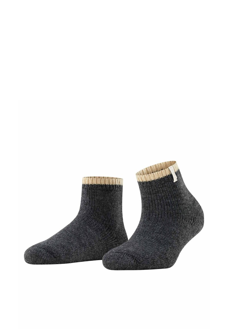 Dark gray socks with a ribbed texture, featuring a cream-colored cuff. Ankle-height design with a small tag on one sock.