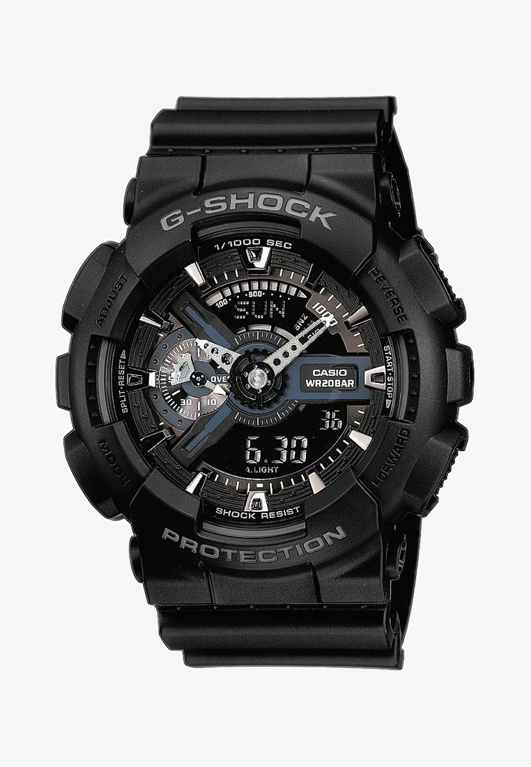 Relógio G-Shock preto com uma pulseira de borracha texturizada, múltiplos mostradores, display digital e detalhes em prata. Apresenta os rótulos "Shock Resist" e "Casio WR20BAR".