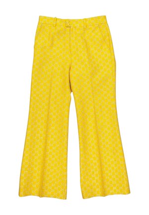 Gelbe weit geschnittene Hose mit einem dezenten weißen geometrischen Muster, vordere Knöpfe, Reißverschluss, Gürtelschlaufen und seitlichen Taschen.