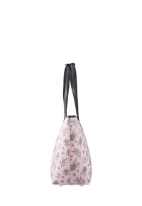 Sac cabas rose avec imprimé floral noir, poignées noires et pieds dorés, présenté de profil sur fond blanc.