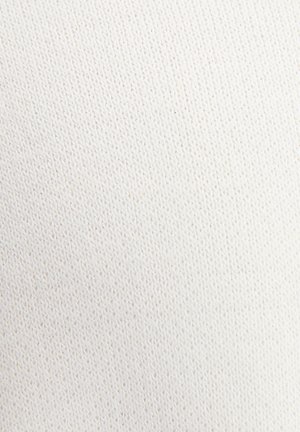 Tessuto a maglia bianco con una fine texture, caratterizzato da punti uniformemente distanziati. Superficie liscia, leggera e dall'aspetto flessibile.