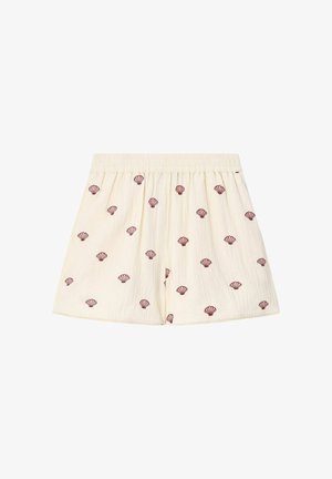 Shorts couleur crème avec une taille élastiquée froncée, décorés de petits motifs dispersés de coquillages rouge foncé.
