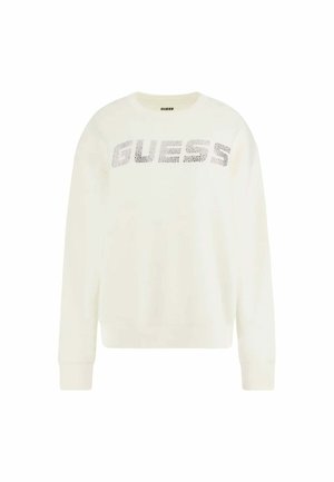 Šviesiai kreminė džemperis su ilgomis rankovėmis, puošnintas tekstūruotu sidabriniu "GUESS" logotipu priekyje. Paprastas apvalus kaklas, laisvas siluetas.