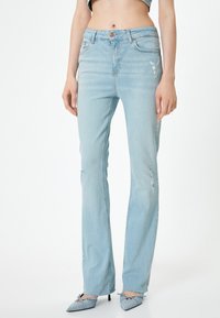 Koton VICTORIA - Flared-farkut - light blue