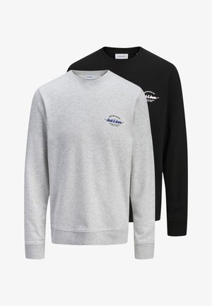 Kaks pikkade varrukatega ümara kaelusega dressipluusi, üks helehall ja üks must, mõlemad väikeste rinnalogodega, millel on kiri "Jack & Jones."