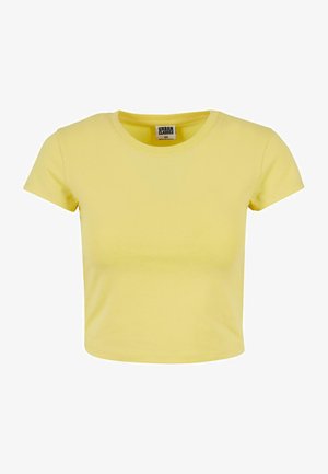 Geel katoenen cropped top met korte mouwen, ronde halslijn en een zachte textuur. Label met "URBAN CLASSICS" zichtbaar aan de halslijn.