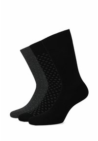 Trzy pary skarpetek: jedne w głębokiej czerni, drugie w ciemnoszarym z jasnoniebieskimi kropkami, a trzecie czarne z fakturowanym wzorem. Wszystkie mają średniej długości mankiety i gładkie wykończenie.