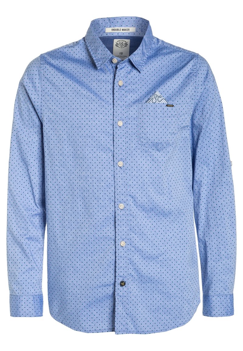 Camisa de manga larga azul con un pequeño patrón de lunares, cierre de botones en la parte delantera y un bolsillo en el pecho con un sutil acento gráfico.