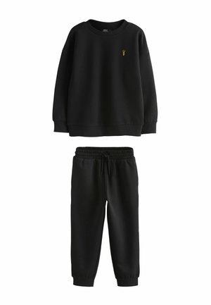 Black sweatshirt and joggers set. Sweatshirt has a round neck, ribbed cuffs, and a small embroidered logo. Joggers feature an elastic waistband.