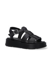 Schwarze Leder-Sandalen mit mehreren Riemen, einem Schnallenverschluss, offenem Zehenbereich und einer dicken Plateau-Sohle. Glatte Textur und modernes Design.