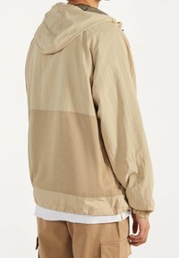 Bershka Outdoorjacka - beige