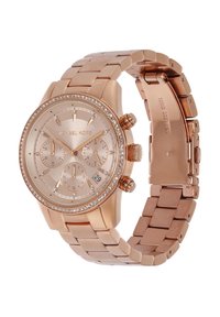 Montre en acier inoxydable rose gold avec un cadran rond, des compteurs chronographe et une lunette ornée de cristaux. Affichage de la date à 6 heures.