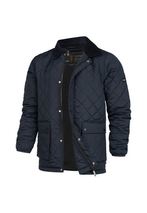 Veste matelassée navy avec un col en velours côtelé, fermeture éclair à l'avant et poches à bouton-pression. Présente une texture lisse et un motif en losange sur l'ensemble.