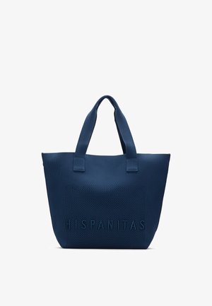 Donkerblauwe textuurtas met twee brede handvatten en reliëf "HISPANITAS"-letters aan de voorkant in het midden.