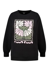 Sweatshirt noir arborant un graphique floral en rose et vert, encadré d'une bordure en spirale décorative. Manches et ourlet côtelés.