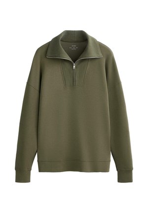 Sweatshirt olive green avec un col montant et une demi-fermeture éclair, détail de col côtelé, et des manches à coupe décontractée. Texture douce.