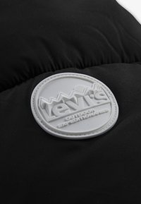 Levi's® PUFFER WITH LOGO ELAS UNISEX - Winterjas - black