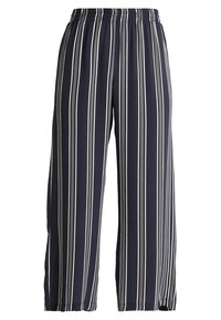 Mörkblå vida byxor med vertikala vita och grå ränder samt elastisk midja.