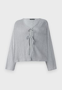 Light grey cropped blouse with long sleeves, V-neck, and front tie closure. Textured fabric displays subtle vertical lines.