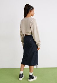 Converse CARGO SKIRT - A-lõikeline seelik - black