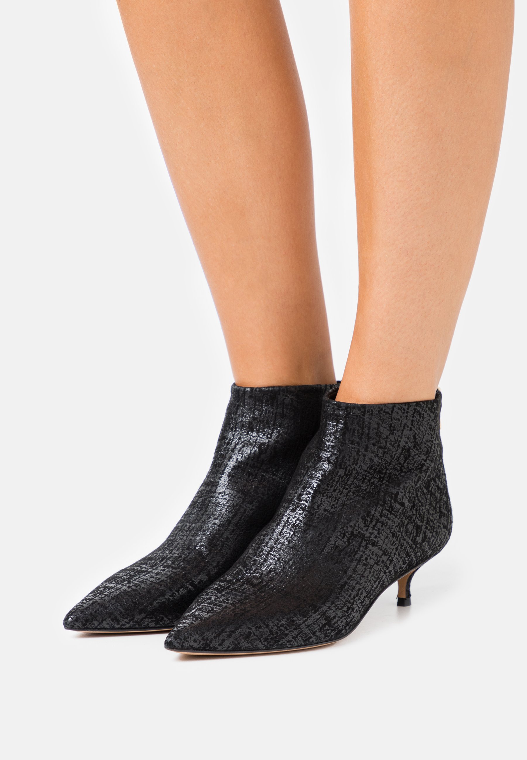 black metallic booties