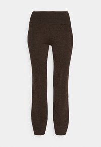 Joggers en tricot marron avec une large taille élastique. Design à jambes droites. Texture douce avec un aspect uniforme et sans motifs visibles.
