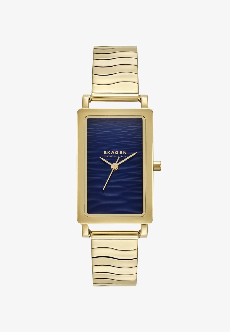 Gold-tone rectangular watch with a blue textured dial, wavy metal bracelet, and two-hand movement. Brand name displayed below the 12 o'clock position.