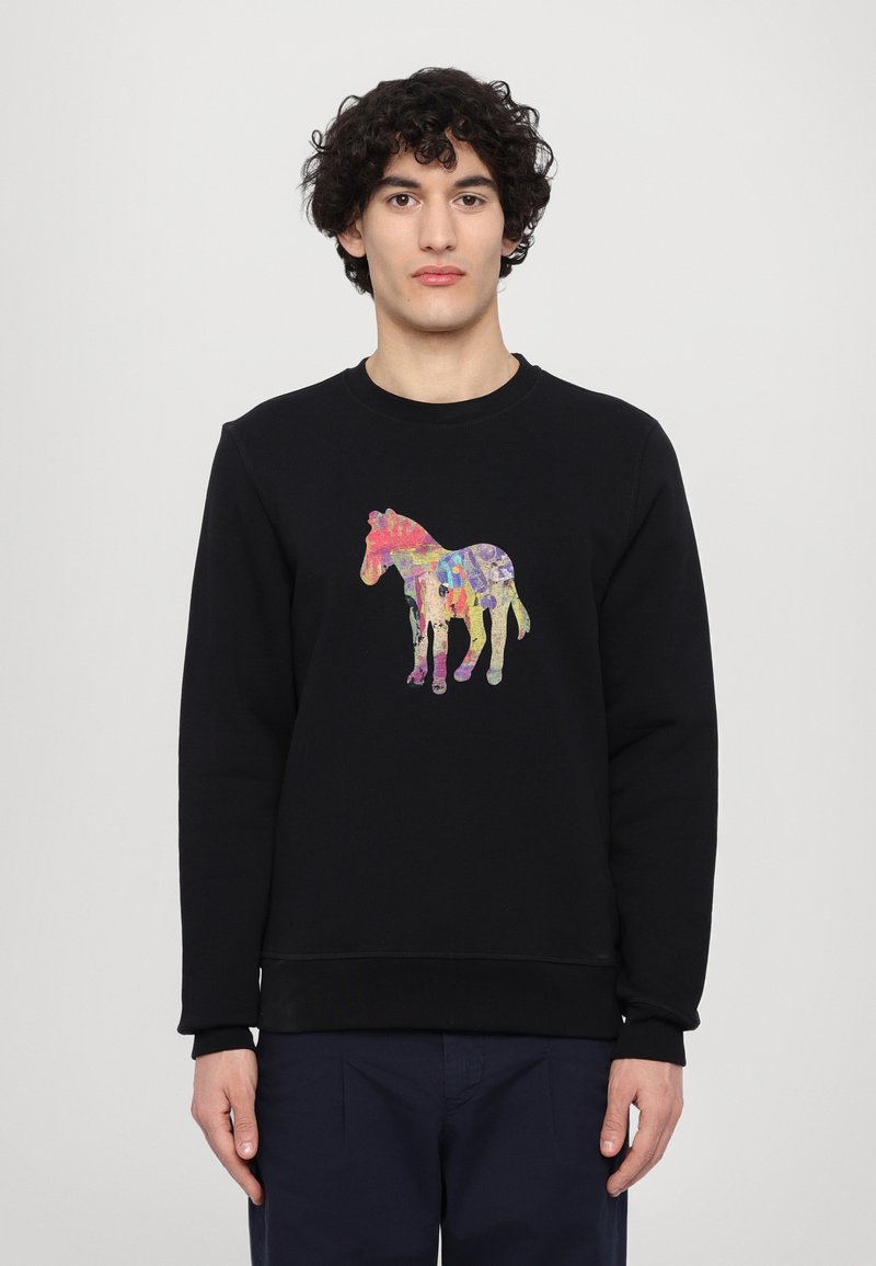 Black sweatshirt featuring a colorful graphic of a horse. The fabric is soft with a round neckline and ribbed cuffs and hem.