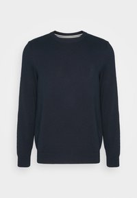 Marineblauwe gebreide trui met een ronde hals, lange mouwen, geribbelde manchetten en zoom, met een subtiel logo op de borst.