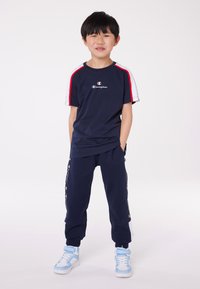 Champion RETRO SPORT PANTS UNISEX - Spodnji deli trenirk - new navy/white