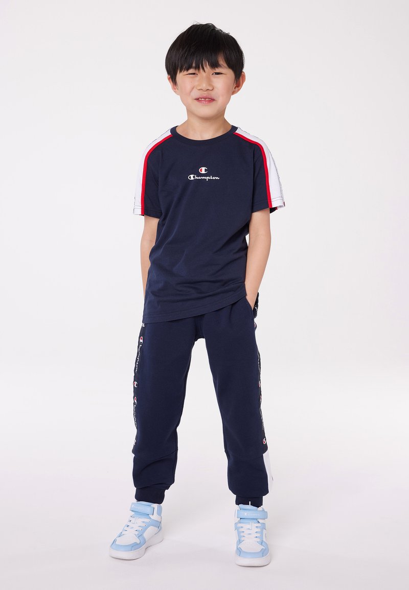 Champion RETRO SPORT PANTS UNISEX - Spodnji deli trenirk - new navy/white