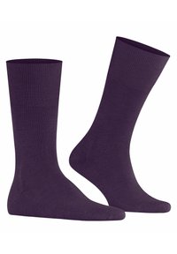 Calzini di cotone viola con un bordo a coste, texture liscia e design classico di lunghezza regular, adatti per un abbigliamento casual.