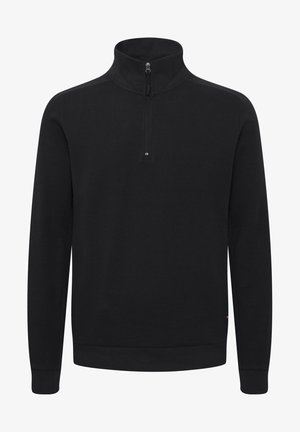 Schwarzer Pullover mit einem halben Reißverschlusskragen, strukturierter Stoff, langen Ärmeln sowie gerippten Bündchen und Saum. Mit einem kleinen Logo-Element auf der Brust.