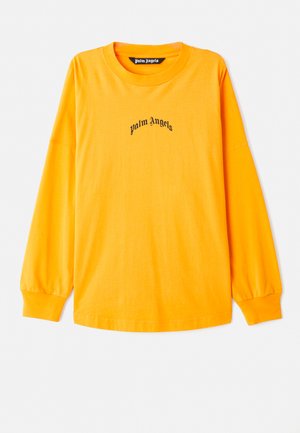 T-shirt à manches longues, de couleur jaune vif, en coton. Doté d'un logo noir "palm angels" centré sur la poitrine. Coupe simple et décontractée.