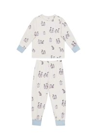 To-delt pyjamasæt i blød cremefarvet stof. Blusen har lange ærmer og pingvinprint; bukserne har elastisk liv og matchende design.