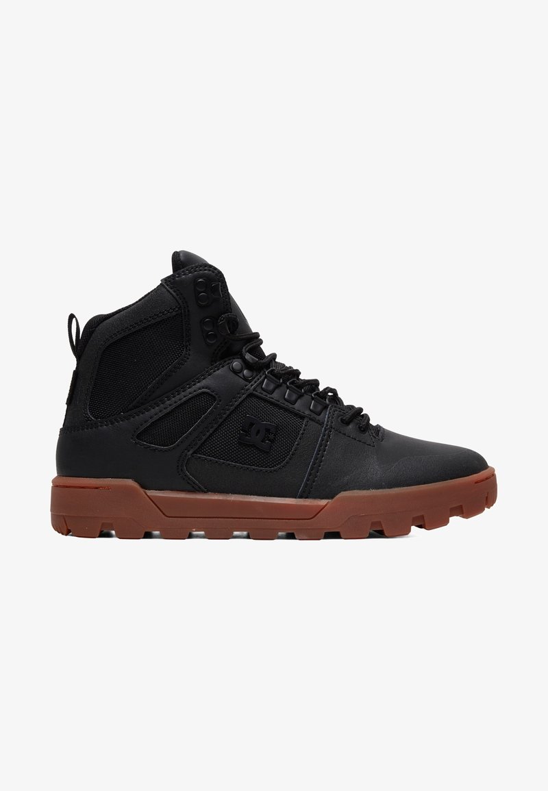 Black high-top sneakers with a textured leather and mesh upper, featuring black hardware, laces, and a brown rubber sole with traction patterns.