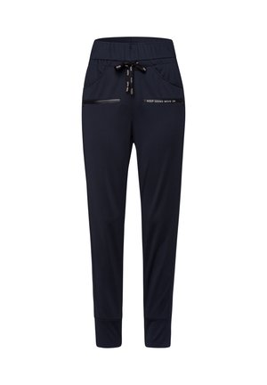 Marineblauwe joggerbroek met elastische tailleband, koordje, ritszakken en tekst "KEEP GOING MOVE ON" op de rechterzak.