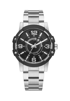 Montre-bracelet pour homme avec cadran rond noir, index et aiguilles argentés, grands chiffres 12, 3, 6, 9, et un bracelet en maillons métalliques argentés.