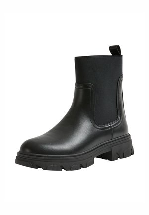 Stivali neri alla caviglia con un upper in pelle liscia, pannelli laterali elasticizzati e una suola in gomma struttura con scanalature profonde per una migliore aderenza.