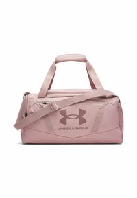 Pink duffel bag with a durable fabric, featuring a padded top handle, adjustable shoulder strap, and the Under Armour logo in gray.