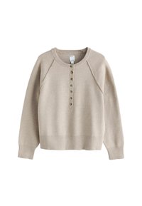 Valkoinen vaalean beige neule, jossa on pyöreä pääntie, raglan-hihat ja viiden napin lista. Varustettu ribatulla hihansuulla ja helmalla, valmistettu pehmeästä materiaalista.