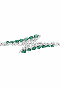 Emerald and diamond bracelet featuring pear-shaped green stones alternating with round clear stones, set in a silver-toned metal design.