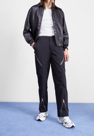 WRSTBHVR Pantaloni - black