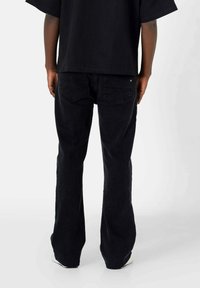 Sixth June Jean flare - black